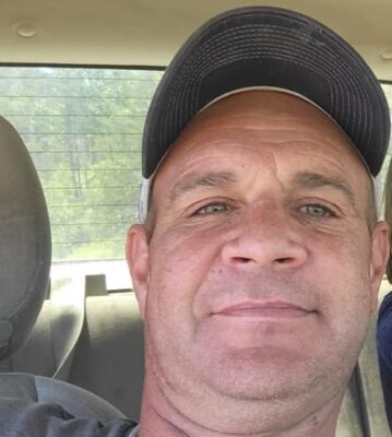 Justin Olin Holland, age 44