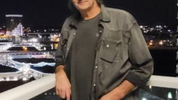 Robert G. Moore, age 53