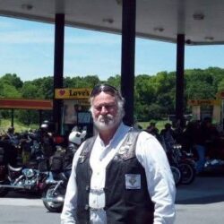 John E. McIntosh, age 84